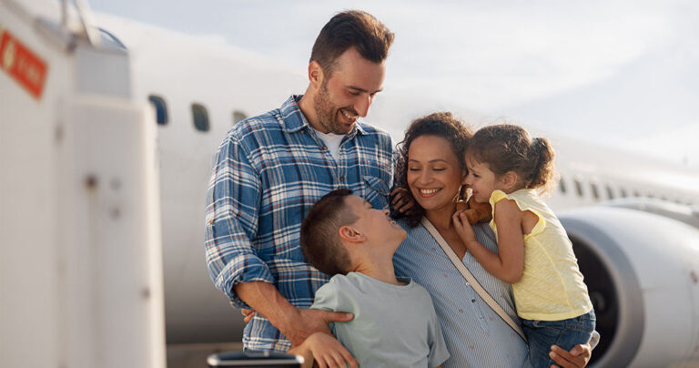 family-four-looking-excited-while-going-trip-standing-front-big-airplane-outdoors-people-traveling-vacation-concept2